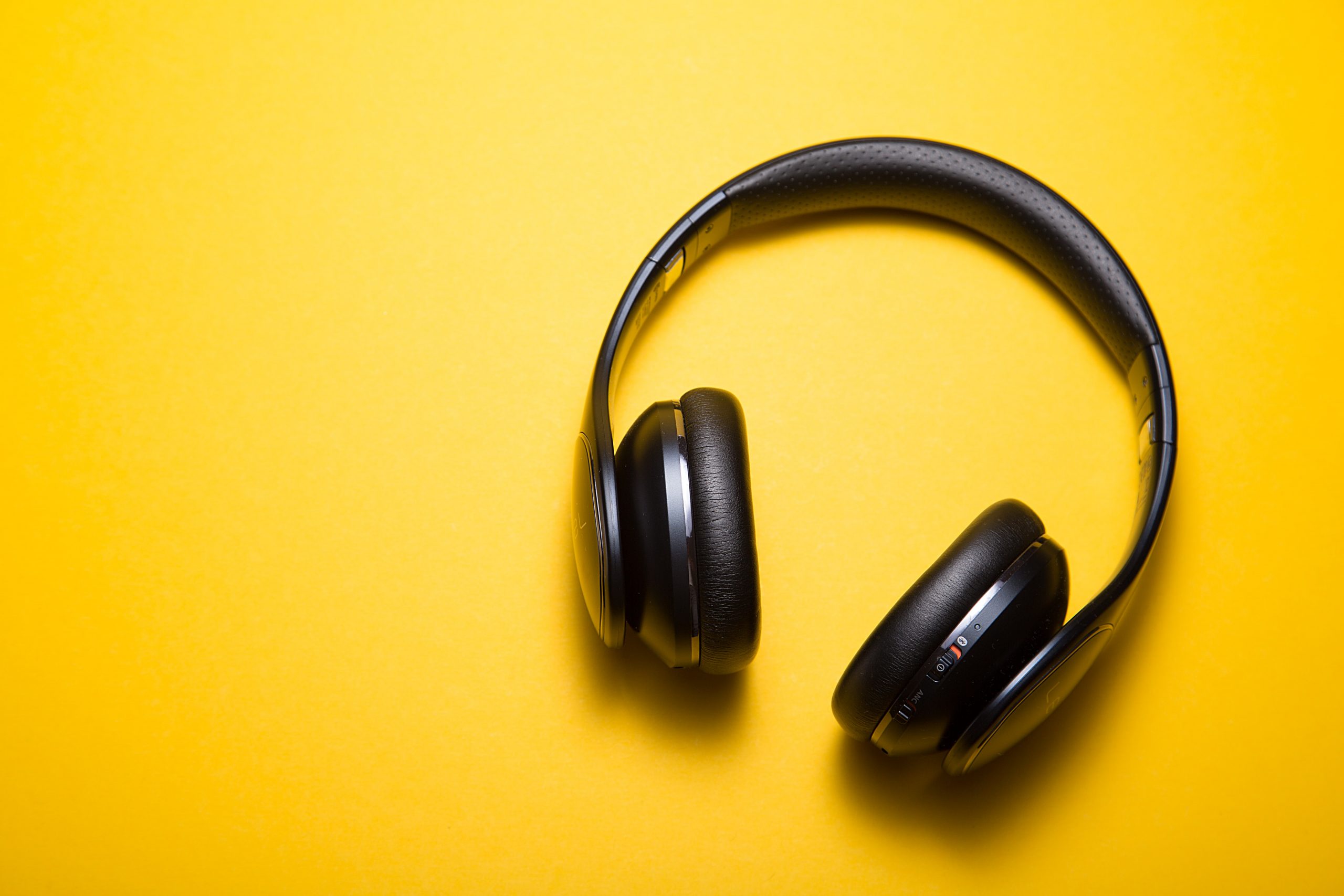 headphones yellow background
